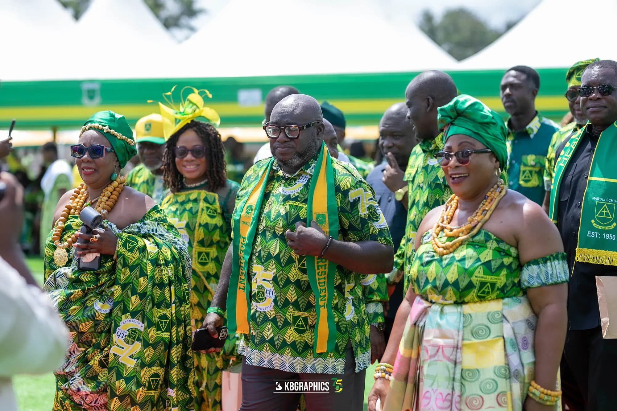 Old Mawulians in green and gold celebrating together